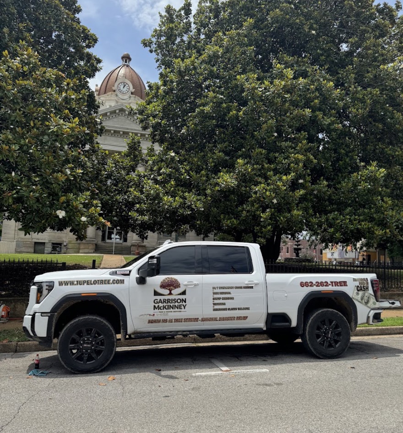 Garrison McKinney crew truck parked at the Alcorn County courthouse in Corinth, MS